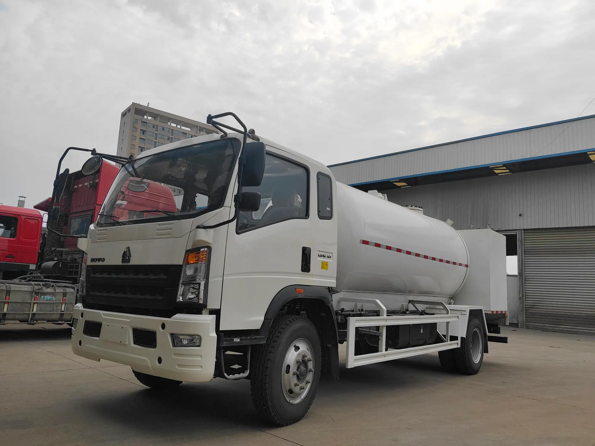 Real LPG dispensing truck photographed from the front left in a factory yard