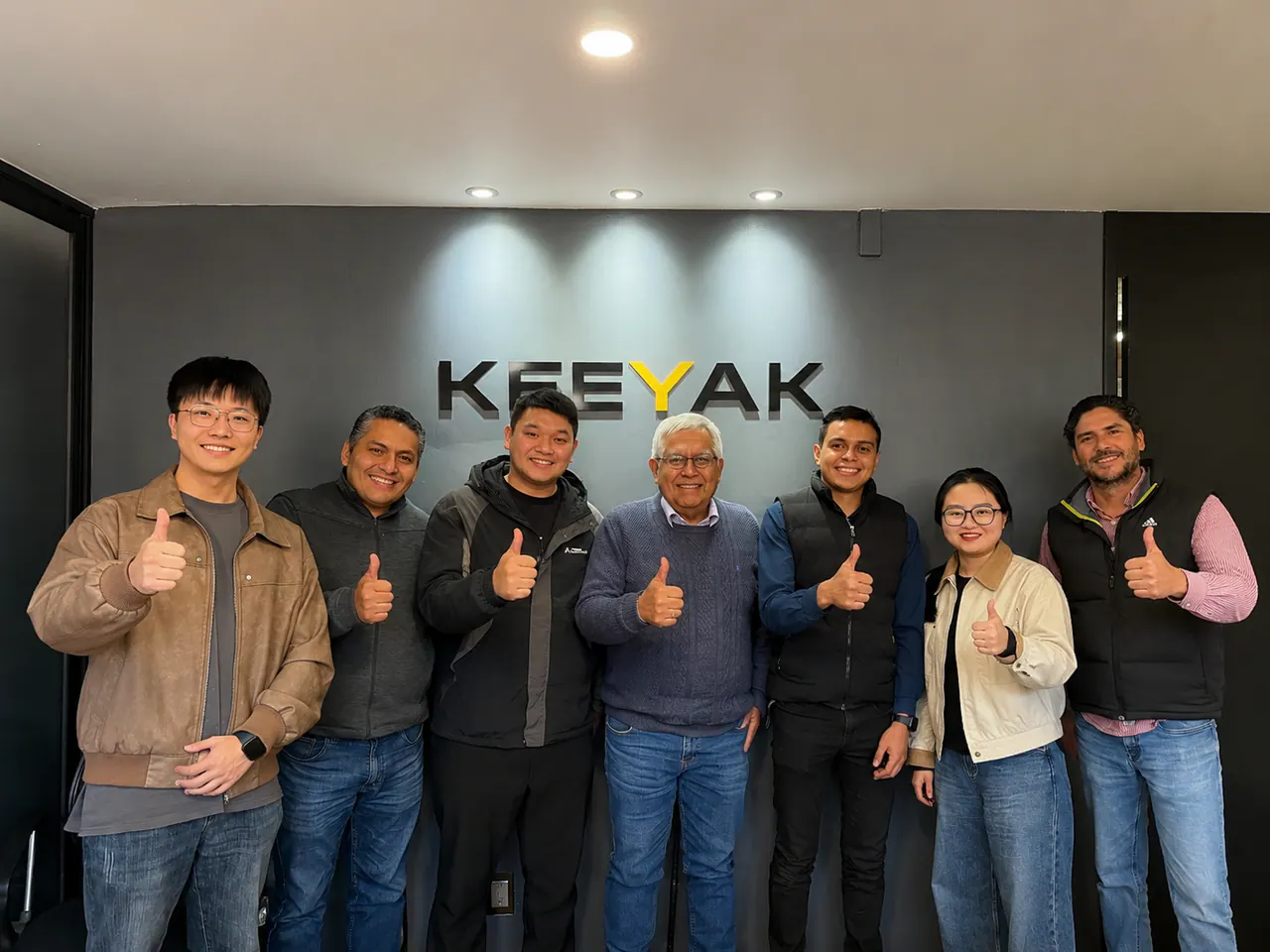 KEEYAK team and visitors taking a group photo at the KEEYAK office
