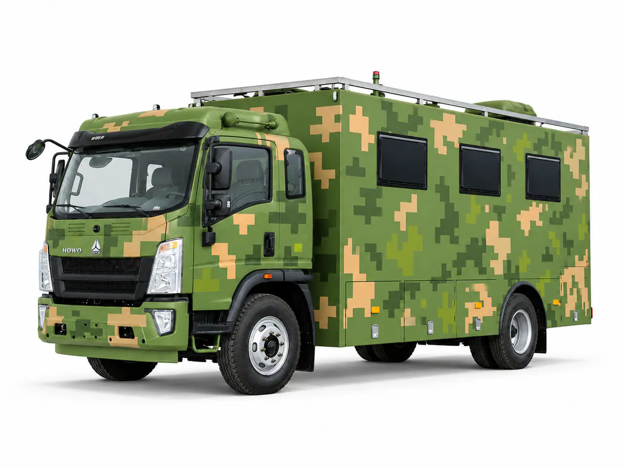 Green camouflage truck with a windowed box body and roof equipment.