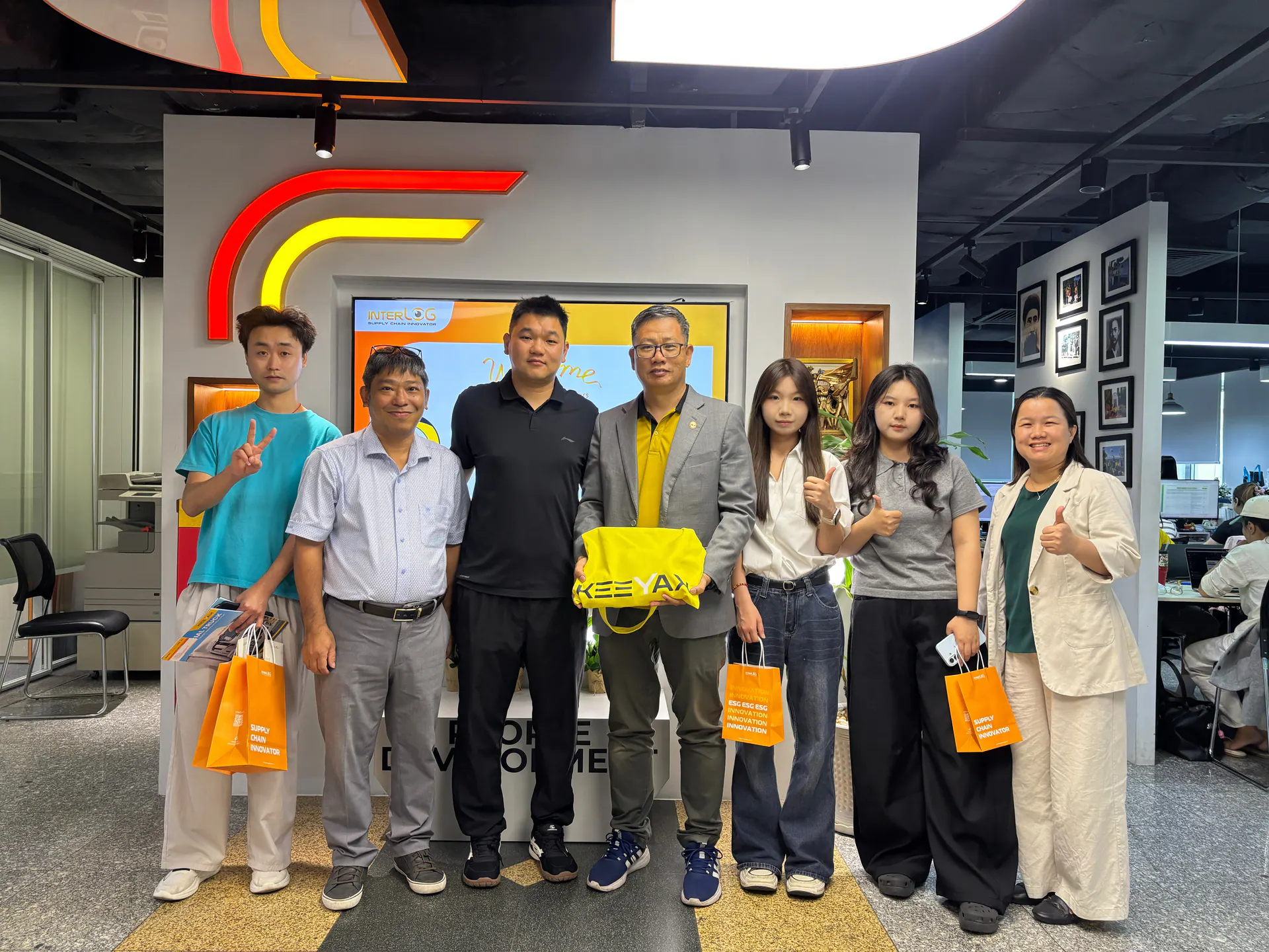 KEEYAK project team and overseas business partners meeting at a logistics office