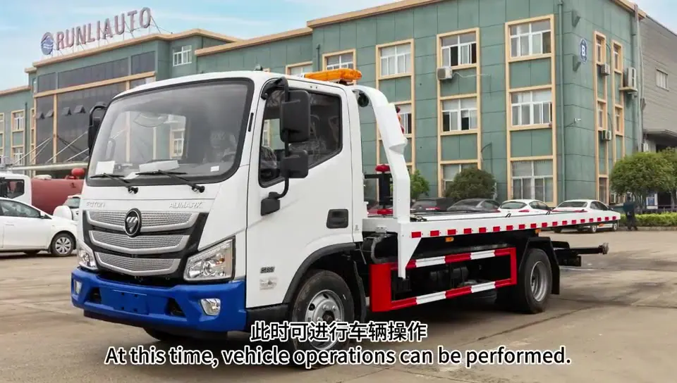 Real rollback wrecker truck photographed from the side
