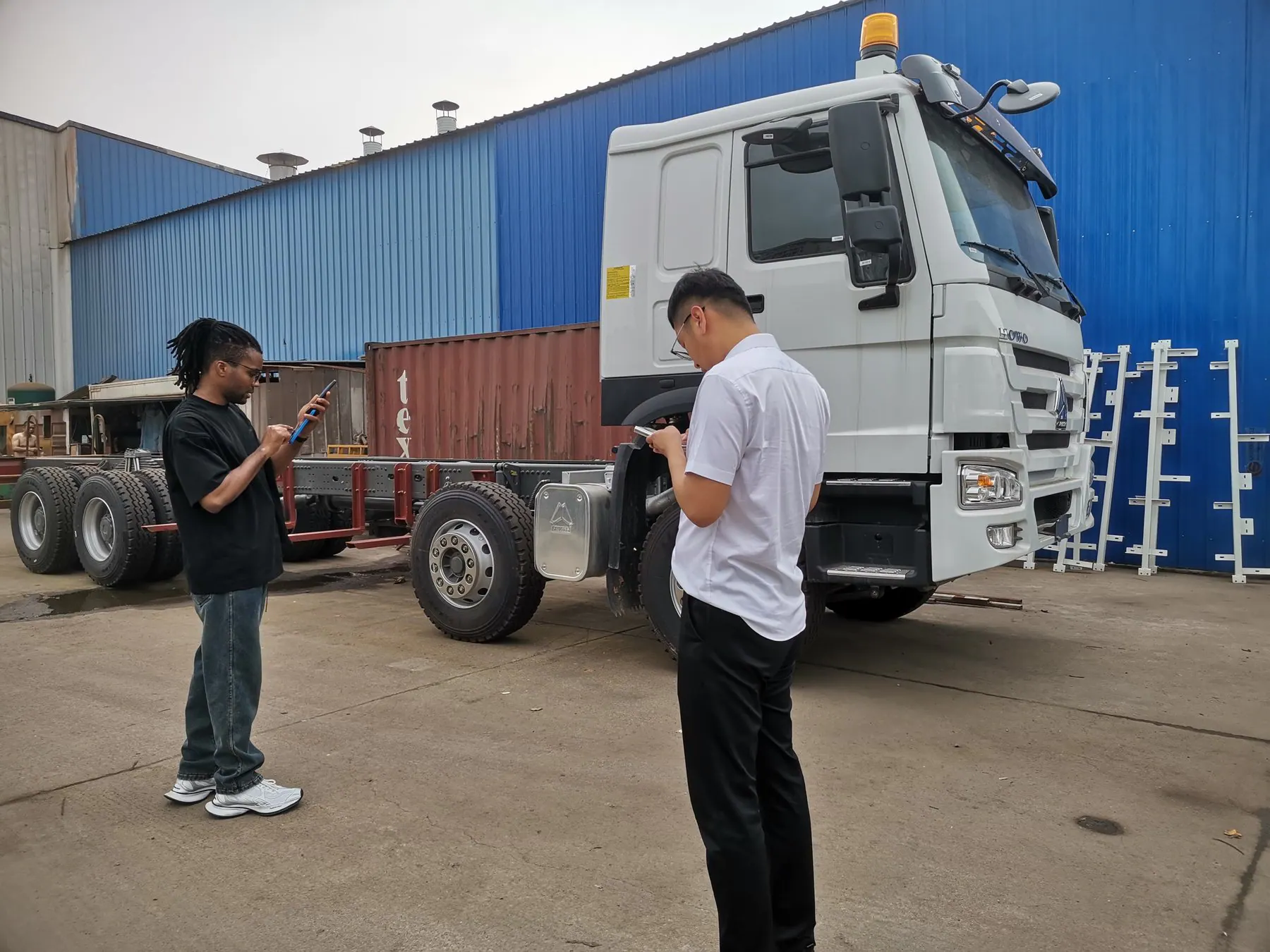 Buyer and project contact recording truck chassis details in the vehicle yard
