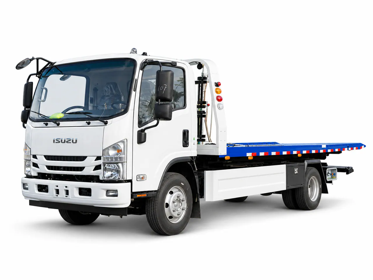 White recovery truck with a blue flatbed and equipment behind the cab.