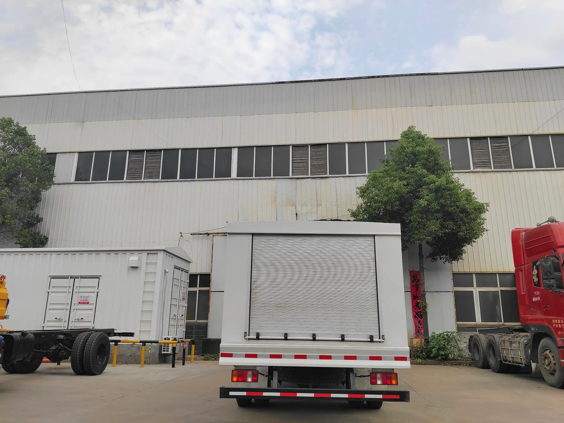 Rear-right photograph of a real LPG dispensing truck and equipment cabinet
