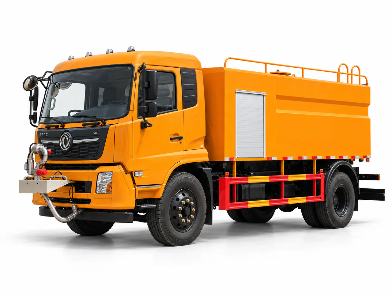 Yellow road washing truck with front spray piping and a box-shaped rear body.