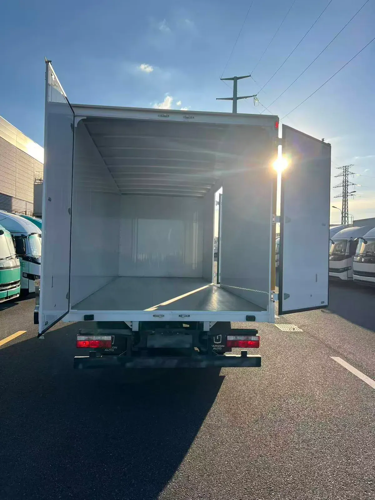 Open rear doorway of an empty enclosed cargo body